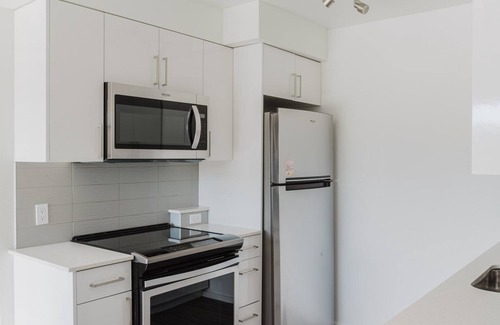 University District Apartamento | Cool U District 1BR w/ Gym, BBQ, W/D & Rooftop