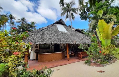 San Juan Complejo | Coral Cay Resort, Inc.