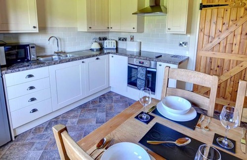 Caersws Casa | Corlan es parte de un grupo de casas de campo recientemente renovadas en la granja del propietario y el carava estático cercano