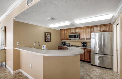 Lower Grand Lagoon Condominio | Corner Unit Right on the Sand, 2 Lagoon-style Pools, Spectacular Views