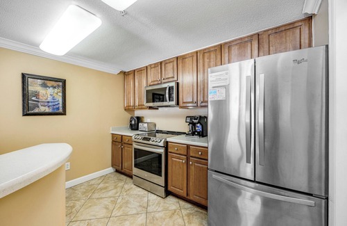 Lower Grand Lagoon Condominio | Corner Unit Right on the Sand, 2 Lagoon-style Pools, Spectacular Views