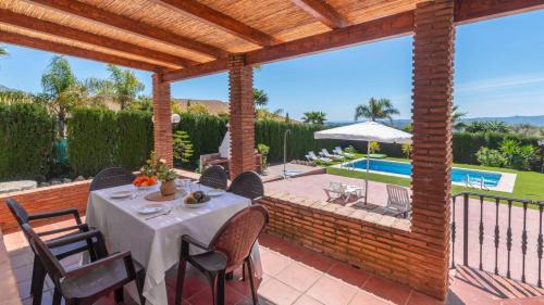 Periana Casa | Cortijo El Púlpito Periana by Ruralidays
