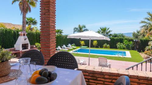 Periana Casa | Cortijo El Púlpito Periana by Ruralidays
