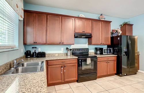 Crystal Cove Casa | ¡Casa de piscina 8BR rentable! Cerca de Disney, SeaWorld y centro de convenciones