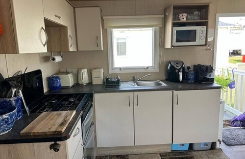 Kessingland Casa | Cosy 6 berth caravan with side decking at Kessingland Beach, Suffolk ref 90031SV
