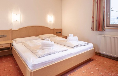 Reith bei Kitzbuehel Apartamento | Cosy apartment for 5 guests with WIFI, hot tub, TV, balcony, pets allowed and parking