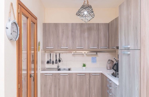 Porto Pozzo Apartamento | Bonito apartamento con WIFI, piscina, A/C, terraza, mascotas permitida y aparcamiento