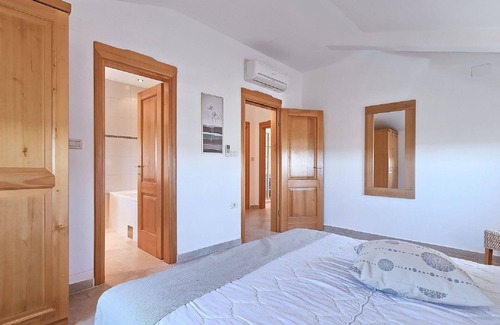 Bibali Casa | Bonito apartamento en villa con WIFI, piscina, A/C, TV, terraza, vista panorámica y aparcamiento