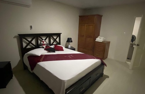 Crown Point Apartamento | Cosy apartment on Merchant Man Ave Crown Point Tobago. near beaches- night life