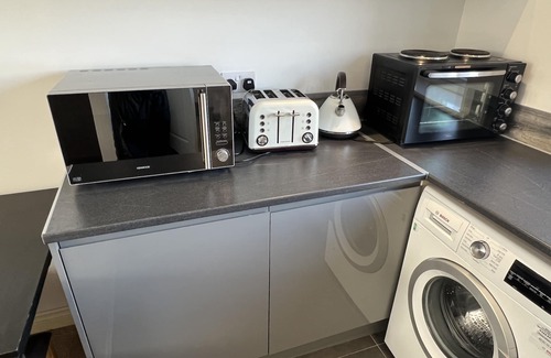Newport Pagnell Apartamento | Cosy apartment suite in Broughton, Milton Keynes.