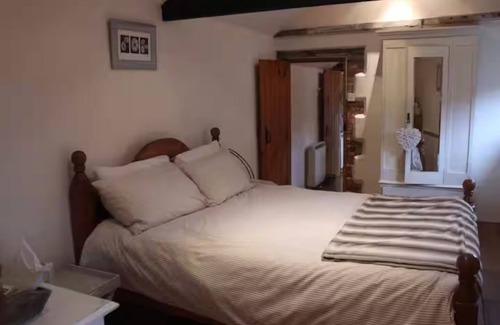 Holt Cabaña | Cosy Cottage Daisy Lodge - Traditional and close to Holt + the coast