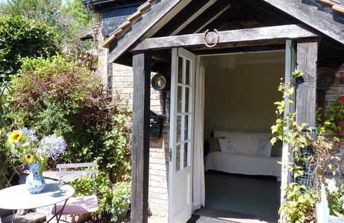 Eastbourne Cabaña | Secret Garden - Acogedor refugio de cabañas para parejas