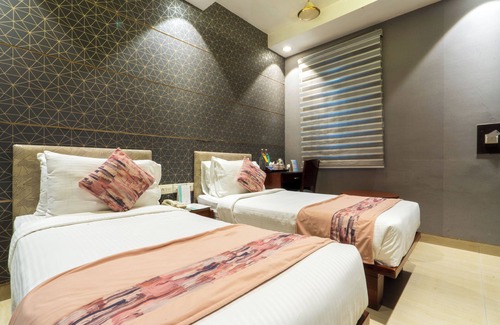 RK Puram Hotel | Cosy Grand @Chanakyapuri by The Cosy Hotels.