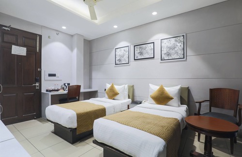 RK Puram Hotel | Cosy Grand @Chanakyapuri by The Cosy Hotels.