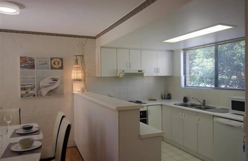 Boomerang Beach Apartamento | Cosy ground floor beach side apartment with linen provided
