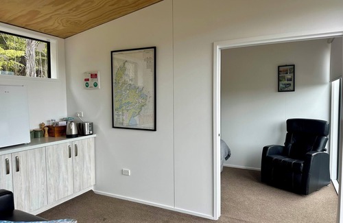 Moetapu Bay Cabina | Cosy modern two bedroom off-grid cabin, in the Marlborough Sounds