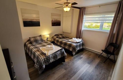 Petite-Riviere-Saint-Francois Apartamento | Cottage Quebec - Olivine