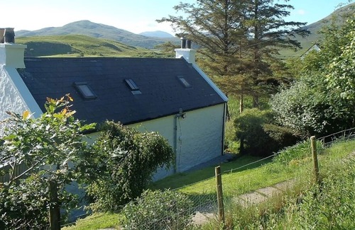 Isle of Scalpay Cabaña | Casa rural cerca de la orilla del mar con vistas al mar ya la montaña, a 13 km de Portree.