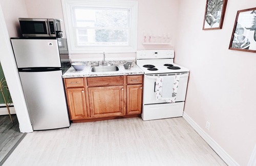 Fredericton Casa | Cottage Feels in the City | Downtown Apartment + Backyard Bliss