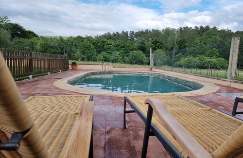 Pepín Casa | Casa rural 'Aldea Rural A Cortiña Apartamento 1' con vistas a la montaña, piscina compartida y Wi-Fi