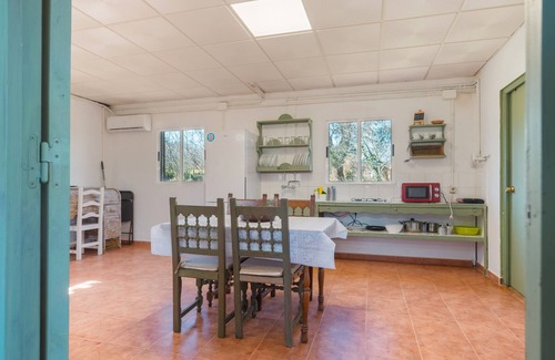 Fuenteheridos Casa | Casa rural 'La Casa Del Taller' con vistas a la montaña, piscina compartida y aire acondicionado
