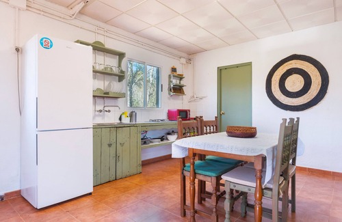 Fuenteheridos Casa | Casa rural 'La Casa Del Taller' con vistas a la montaña, piscina compartida y aire acondicionado