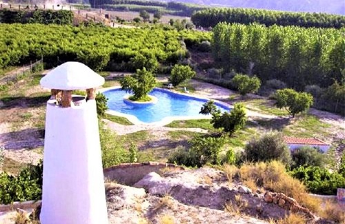 Benalúa de Guadix Casa | Casa rural 'Los Cerezos' con piscina compartida, Wi-Fi y aire acondicionado