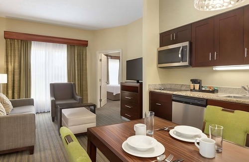 Feather Sound Hotel | Couples Reatreat! Outdoor Pool, Full Kitchen, Free Breakfast!