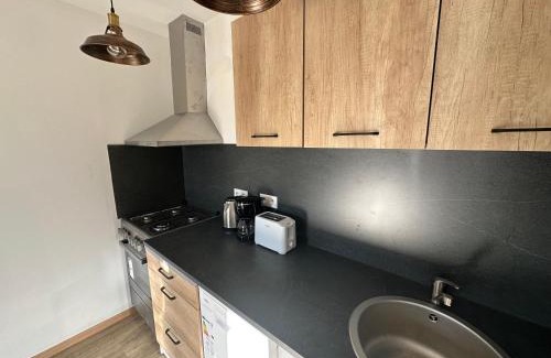 Gerardmer Apartamento | Cour ancienne école avec Jacuzzi privé