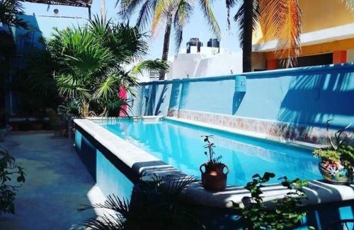 Puerto Yucalpetén Apartamento | Courtyard family room
