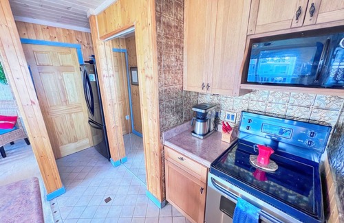 Conway Condominio | Cozy 1 bd/1.5 Bath Condo in tranquil Crooked Lake with Kayaks & Dock