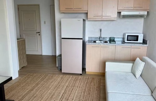 Wack-Wack Greenhills Condominio | Cozy 1-BDR condo with AC, Hot Water, and WiFi in Brgy Wack-Wack Greenhills