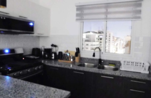 La Julia Apartamento | Cozy 1-bedroom apt in Bella Vista, Sto Dgo with Rooftop,Pool, Gym, Parking,WiFi