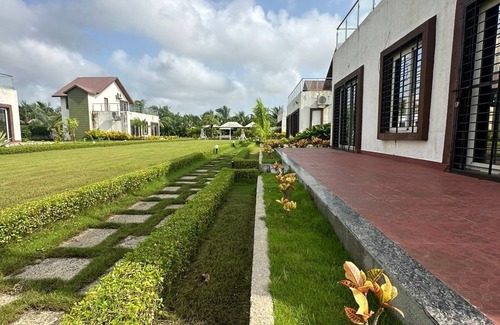 Navsari Casa | Cozy 1-bedroom bungalow with AC and fitness room in lovely UBHARAT