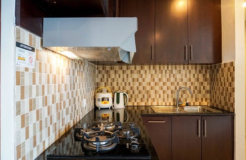 Karet Apartamento | Cozy 2BR at Empyreal Epicentrum Apartment By Travelio