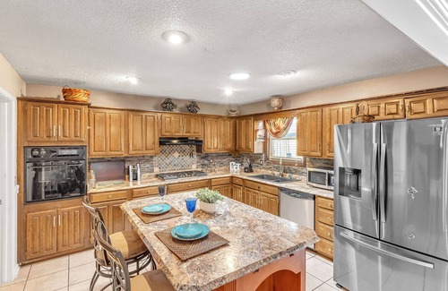 Tulsa Casa | Cozy 4 Bedroom Home - Minutes to Downtown Tulsa by RedAwning
