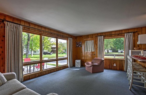 Burt Lake Casa | Cozy Alanson Cottage - Steps to Dock on Burt Lake!