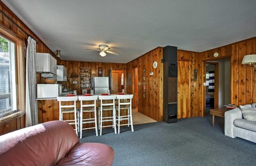 Burt Lake Casa | Cozy Alanson Cottage - Steps to Dock on Burt Lake!