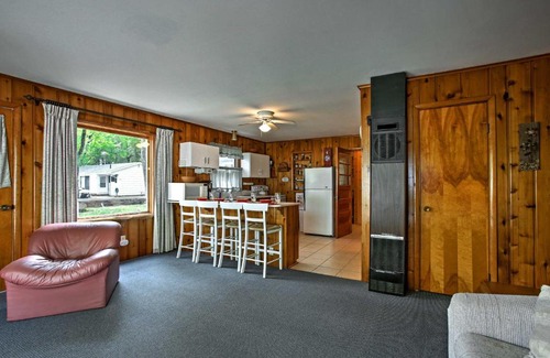 Burt Lake Casa | Cozy Alanson Cottage - Steps to Dock on Burt Lake!