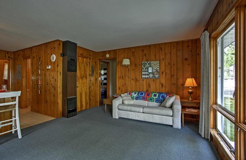 Burt Lake Casa | Cozy Alanson Cottage - Steps to Dock on Burt Lake!