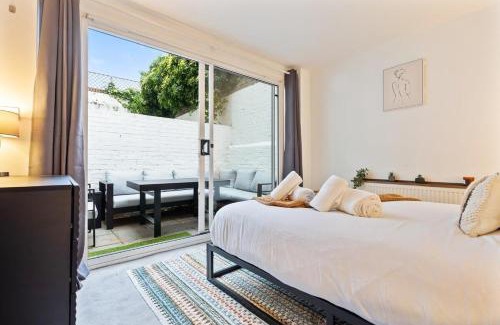 Fulham Broadway Apartamento | Cozy and Quiet Central 2 minutes walk from Main Street flat w Garden