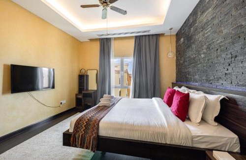 Discovery Gardens Apartamento | Cozy and spacious apartment- 5min walk to metro