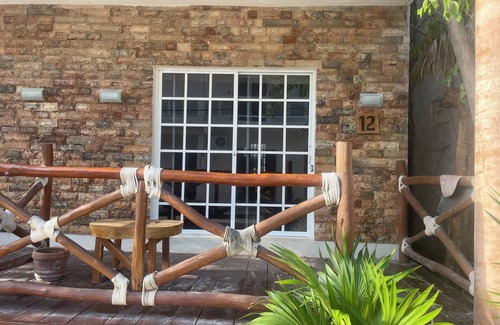 Downtown Holbox Apartamento | Cozy apartment in charming Holbox with AC, WiFi cuarto en planta baja