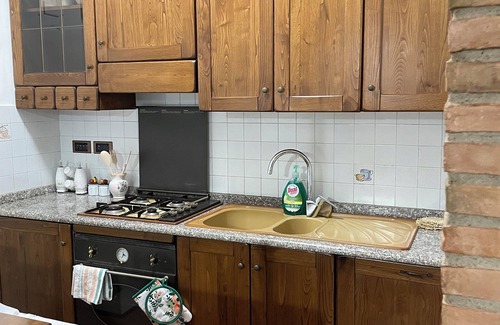 Fratta Apartamento | Cozy apartment in a villa with pool surrounded by olive trees in Todi- Leccio
