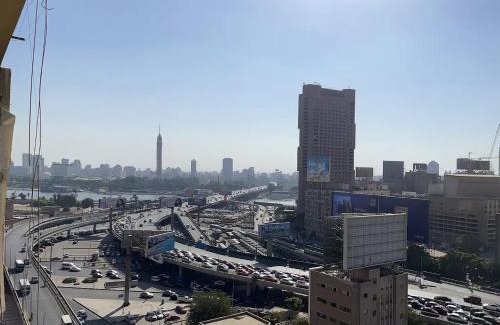 Qasr an-Nil Apartamento | Cozy bedroom overlooking downtown & the Nile