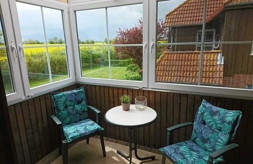Wenkendorf Condominio | Cozy, bright vacation apartment on 2 levels with conservatory