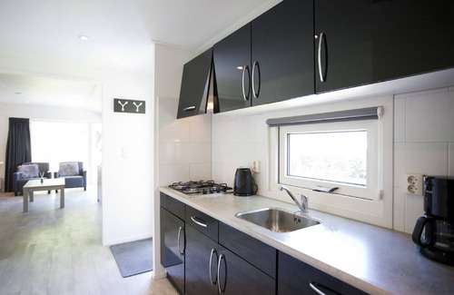Noordoostelijk van Schaarsbergen Chalet De Esquí | Acogedor chalet en un parque de vacaciones, junto al Parque Nacional Hoge Veluwe