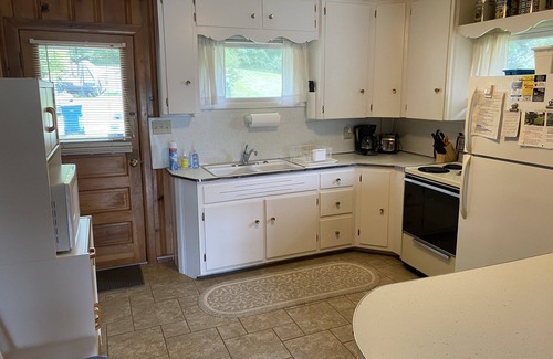 Angola Cabaña | Cozy Classic Cottage Right on The Water + Private Dock
