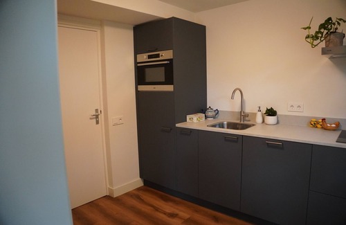 Ophemert Casa | Greener greener greenest! Cozy 4 person coach house with spacious garden in the Betuwe