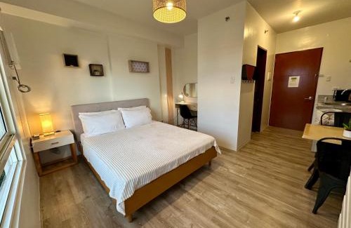 Bantud Hacienda Apartamento | Cozy Condo bedroom in Bacolod City